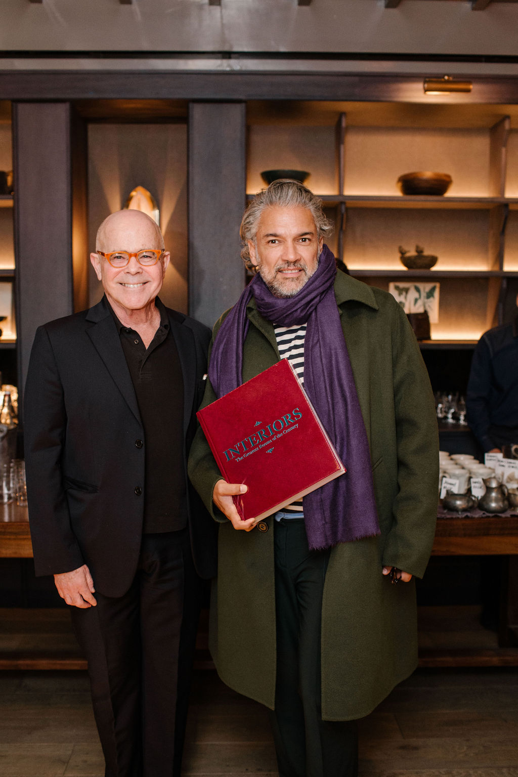 Phaidon's William Norwich with interior designer Carlos Mota at the launch for Interiors: The Greatest Rooms of the Century at Roman and Williams Guild New York
