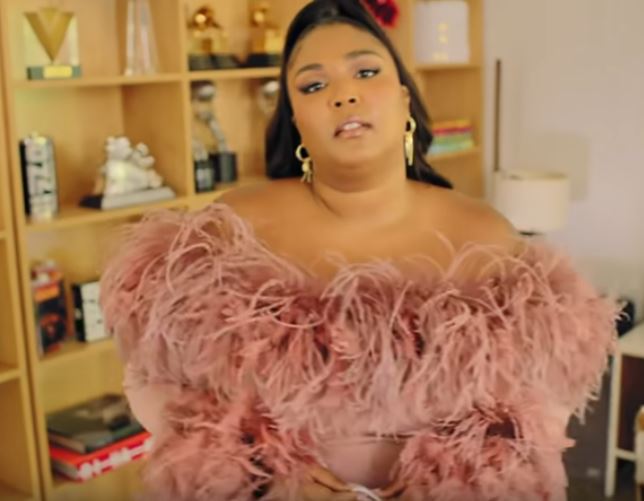 Lizzo in her LA home with her copy of Phaidon's Rihanna book (bottom left). Image courtesy of Vogue's YouTube channel