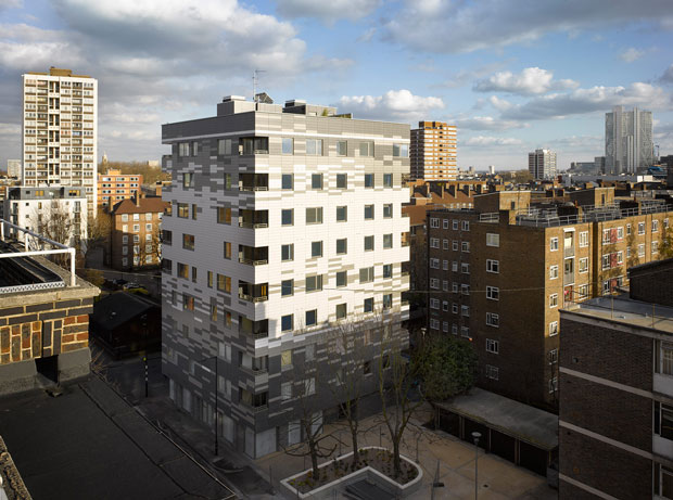 Murray Grove exterior, London, UK, 2009. Murray Grove, a 9-story residential building designed by Waugh Thistleton Architects, was the world’s first multi-story building to have load-bearing walls, floor slabs, stairs, and elevator cores constructed entirely out of mass timber. (Photo: Will Pryce. Courtesy Waugh Thistleton Architects)